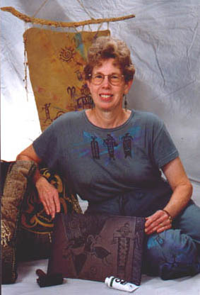 Carol Wilcher with petroglyph linoleum block